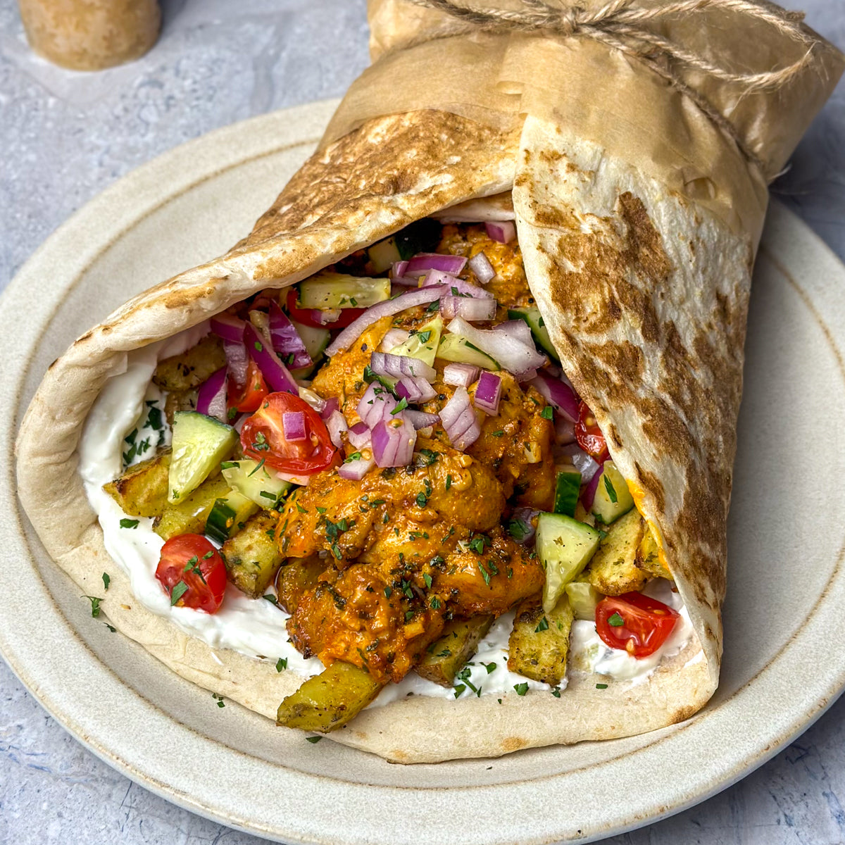 Loaded Schwarma -Middle Eastern/Indian Spicy Beef or Chicken Handmade Flatbreads with Hummus, salad with fries